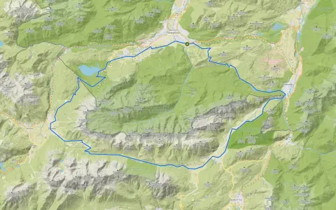 Eine MTB-Tour-Route schlängelt sich durch die beeindruckende Berglandschaft von Garmisch-Partenkirchen, vorbei an Gipfeln wie Zugspitze und Alpspitze.