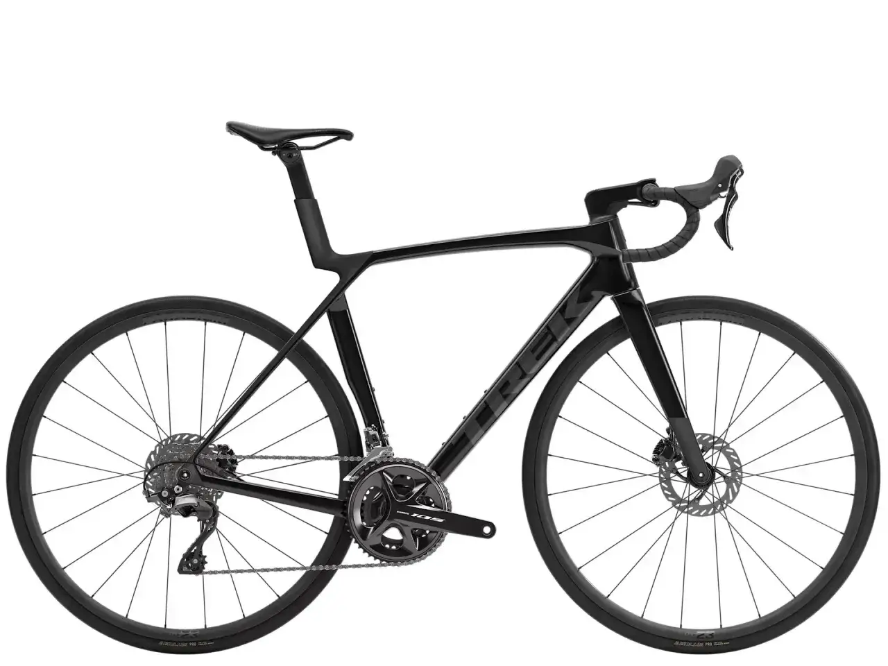 Schwarzes Trek Domane SL Comp Rennrad mit aerodynamischem Rahmen und Scheibenbremsen, bereit f&uuml;r dynamische Fahrten.